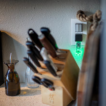 Load image into Gallery viewer, PurpleAir PIXEL in a kitchen.